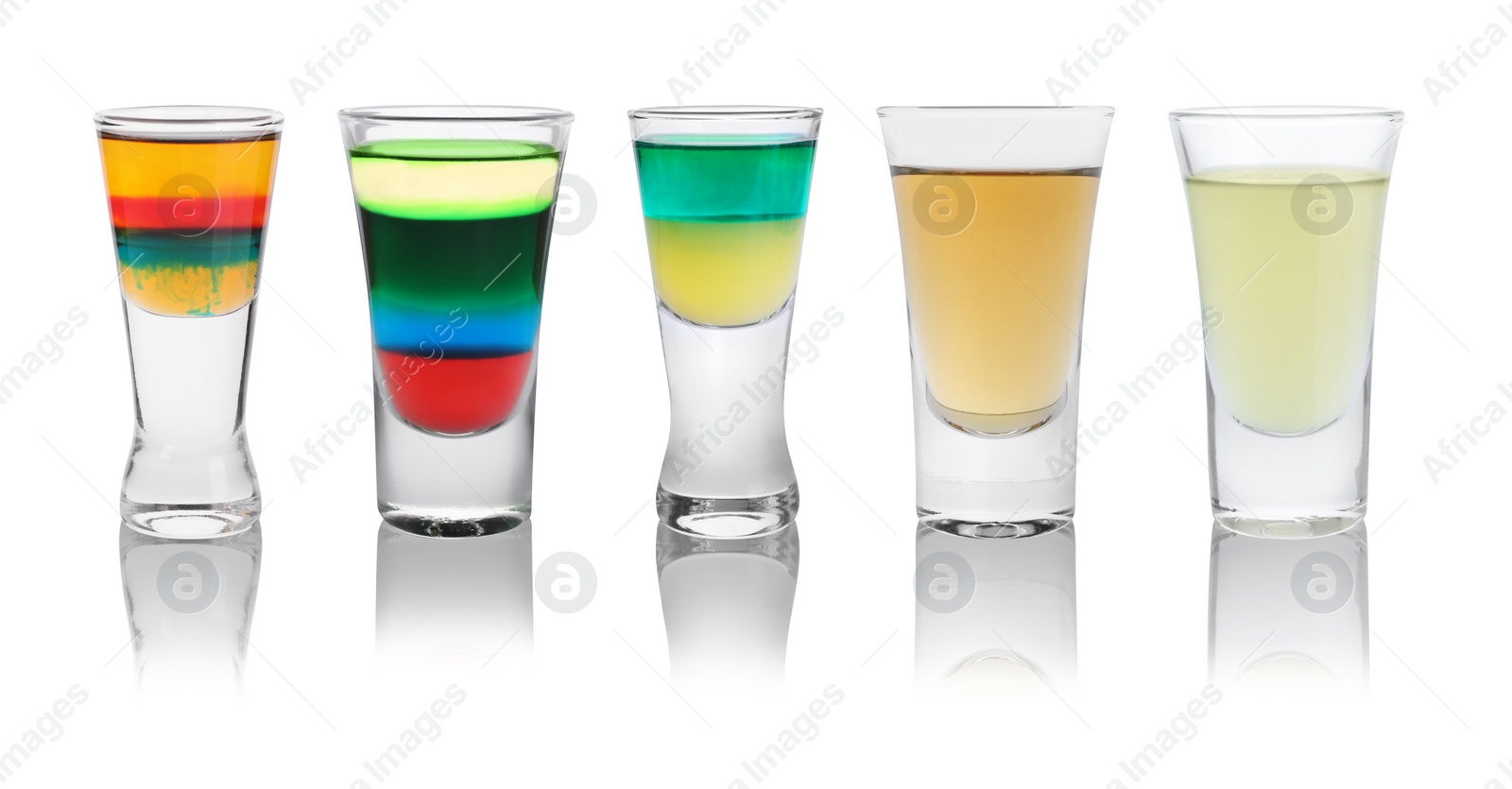 Image of Different shooters in shot glasses isolated on white, set