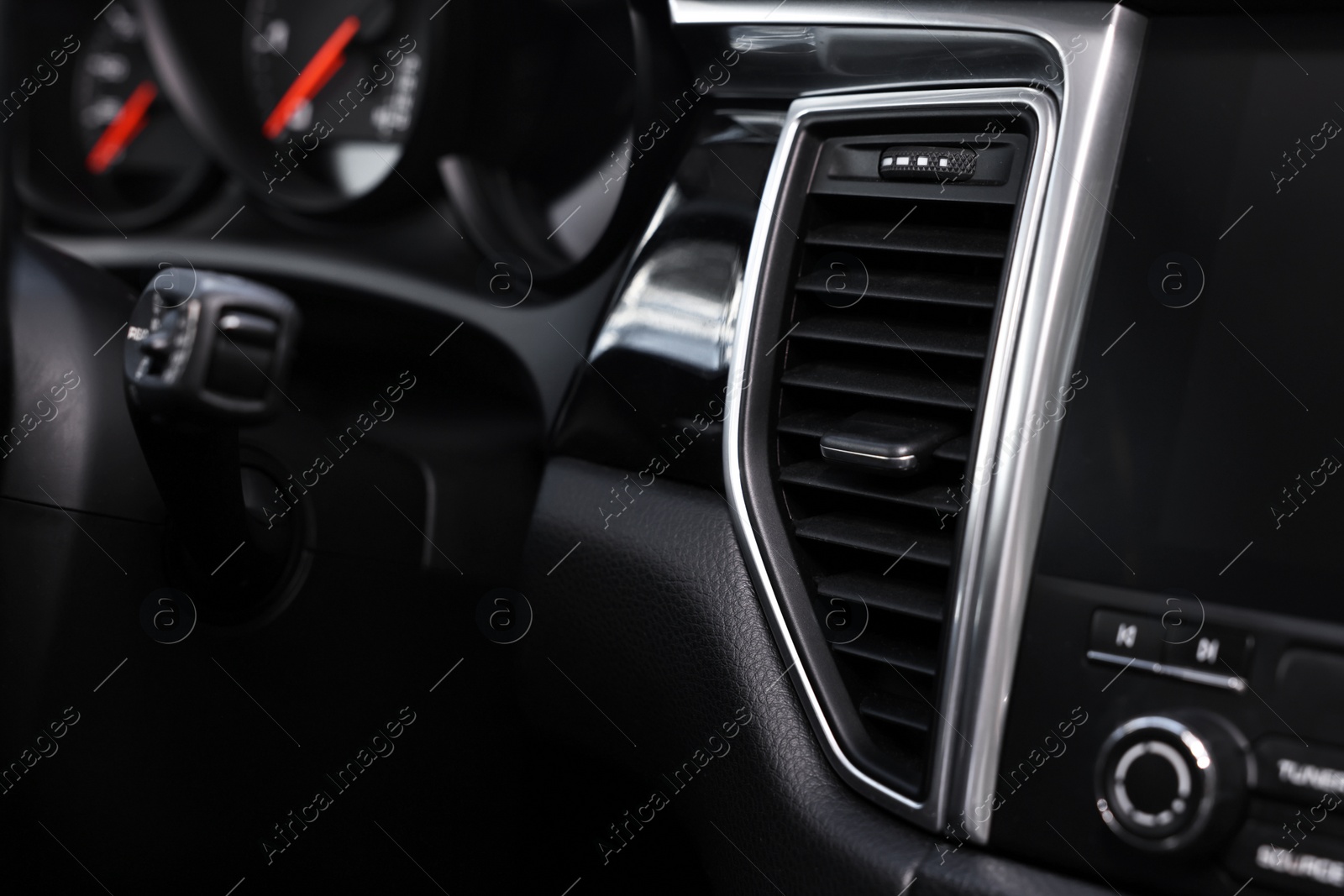Photo of Inside of modern black car, closeup view