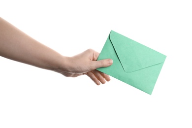 Woman holding green paper envelope on white background, closeup