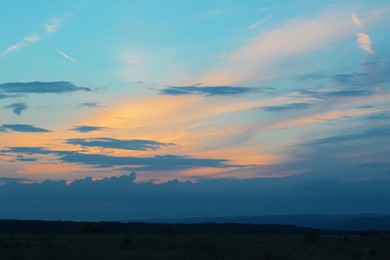 Beautiful landscape with sky lit by sunset