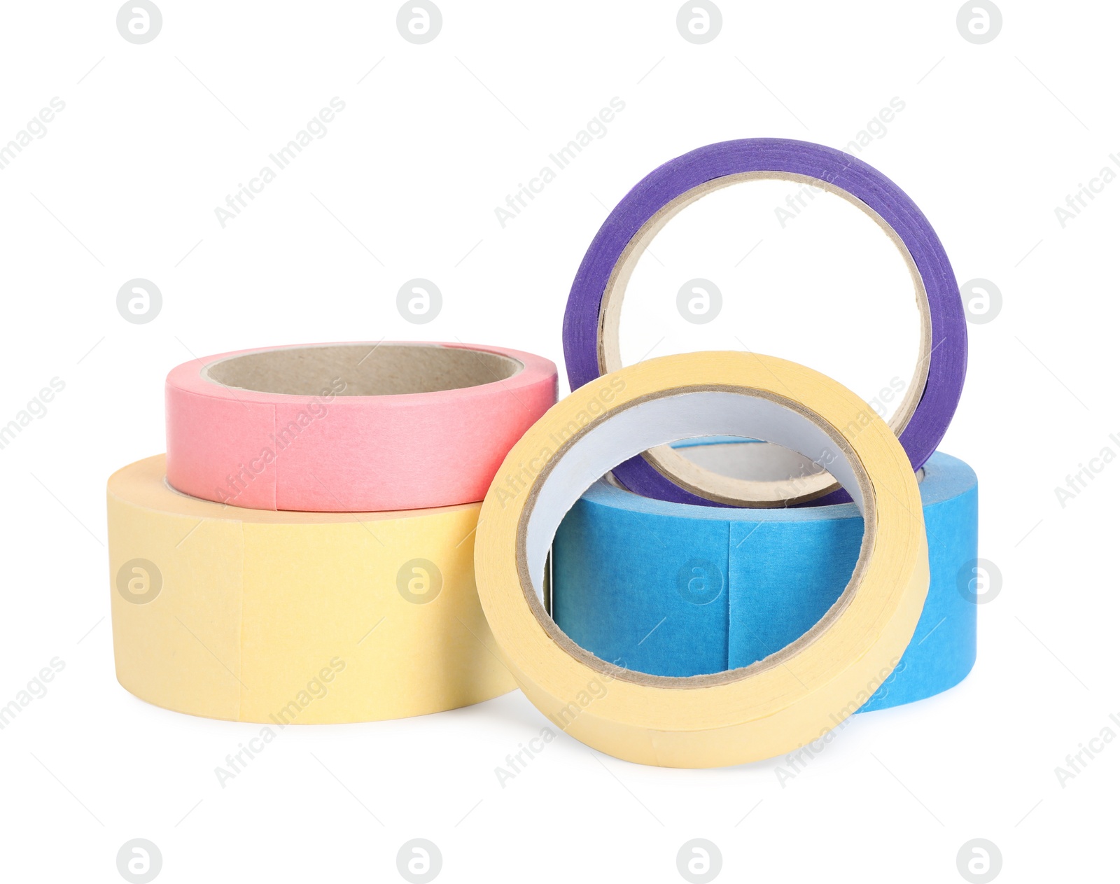 Photo of Many different rolls of adhesive tape on white background