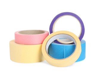 Photo of Many different rolls of adhesive tape on white background