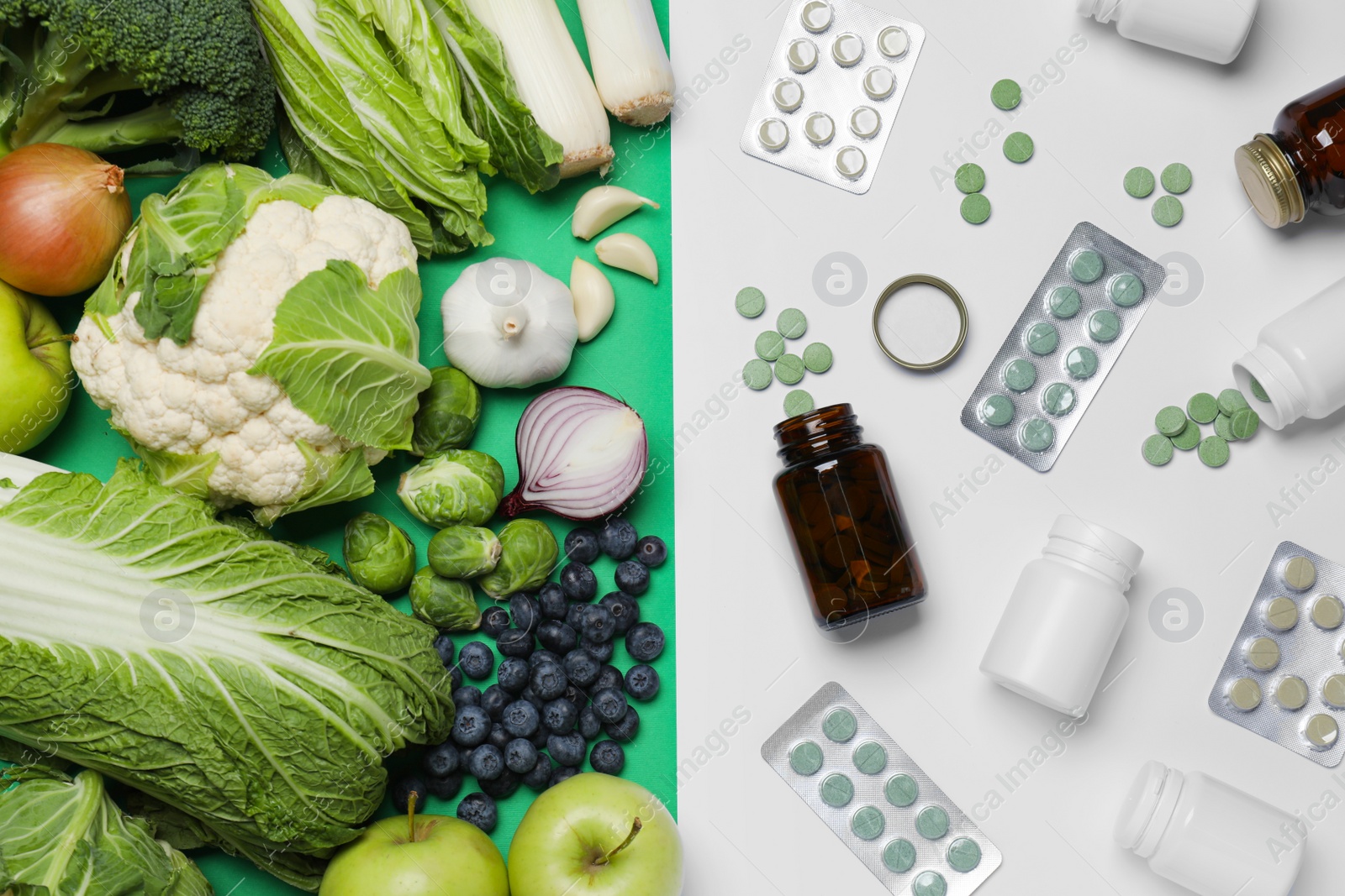 Photo of Different prebiotic supplements and foodstuff on color background, flat lay