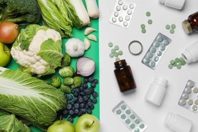 Photo of Different prebiotic supplements and foodstuff on color background, flat lay