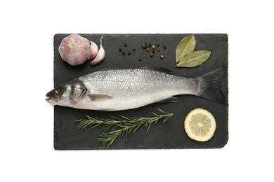 Photo of Tasty sea bass fish and ingredients isolated on white, top view