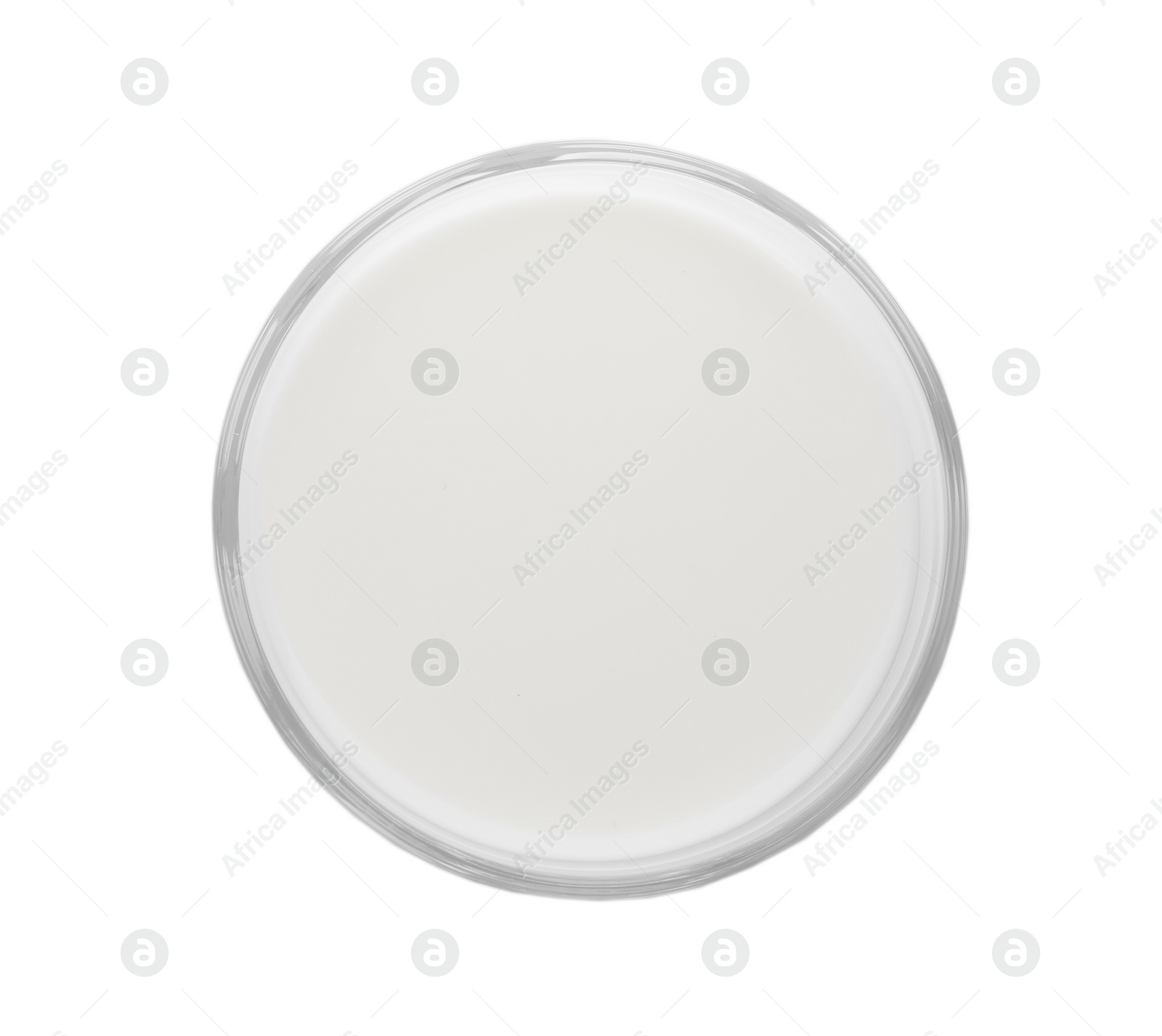 Photo of Glass with fresh milk isolated on white, top view