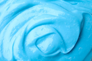 Photo of Texture of light blue professional face mask as background, closeup
