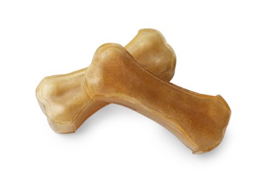 Photo of Chew bones for dog isolated on white. Pet toys
