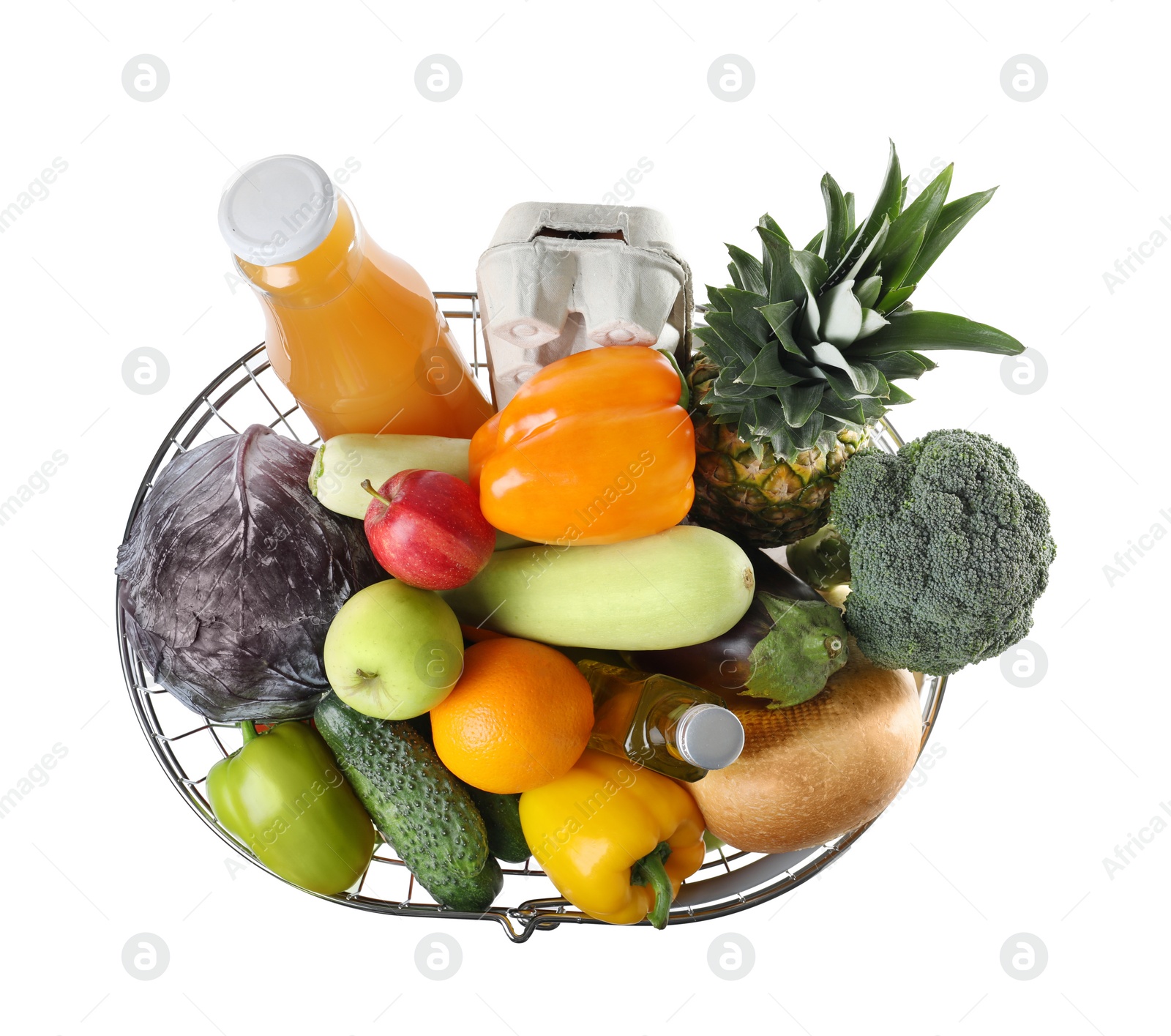 Photo of Shopping basket with grocery products on white background, top view