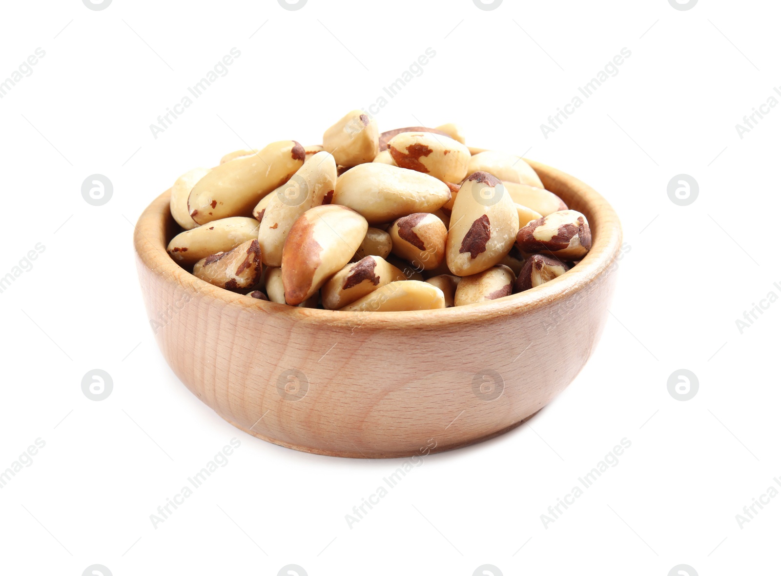 Photo of Wooden bowl with Brazil nuts on white background