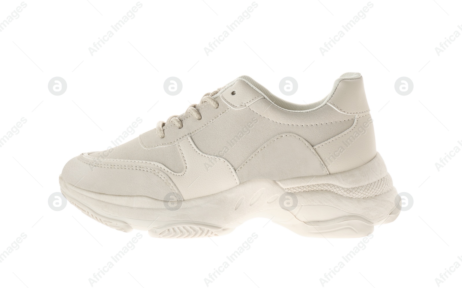 Photo of Stylish sports shoe isolated on white. Trendy footwear