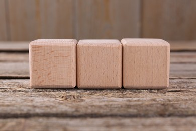Photo of International Organization for Standardization. Cubes with abbreviation ISO on wooden table