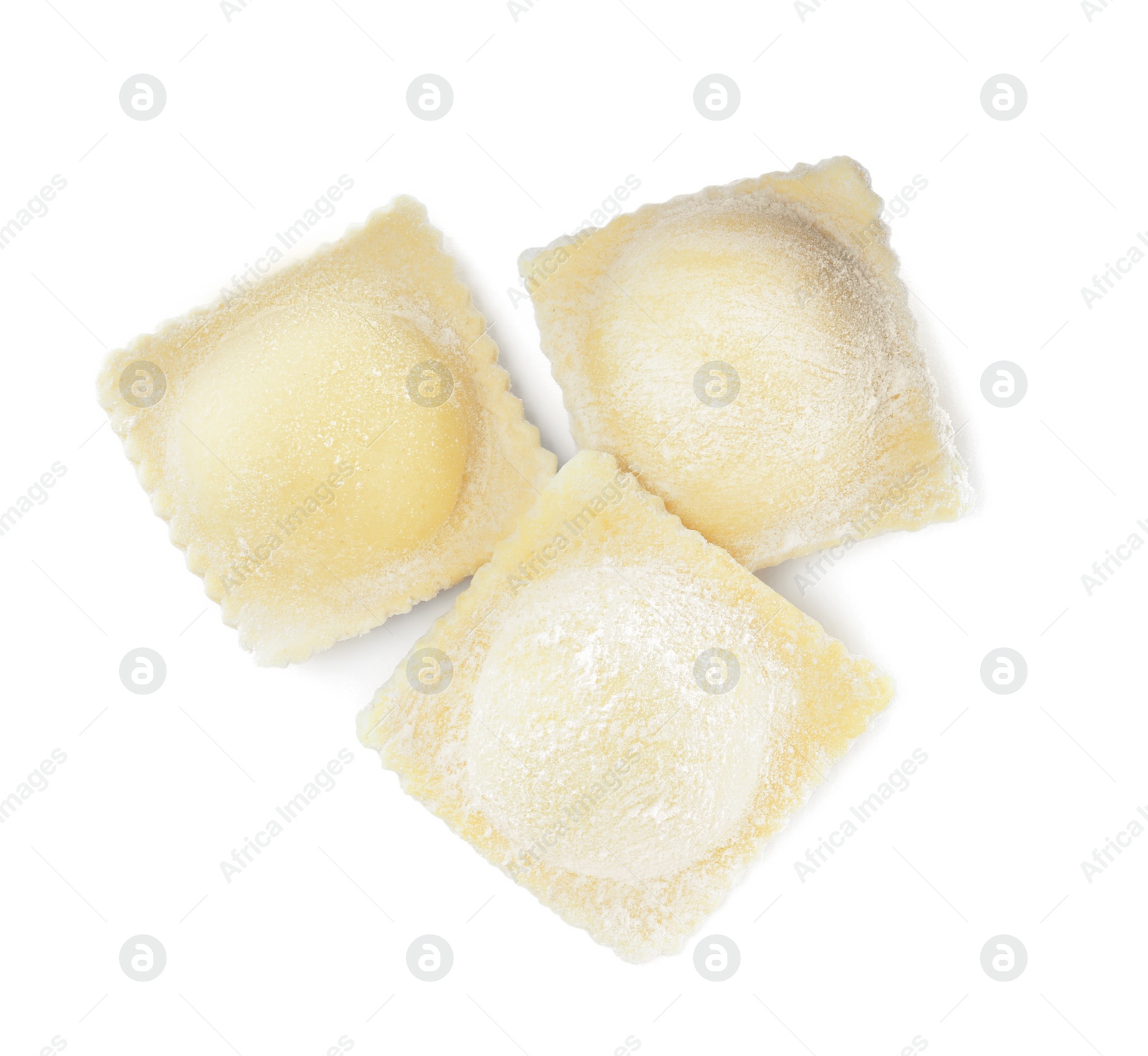 Photo of Uncooked ravioli with filling on white background, top view