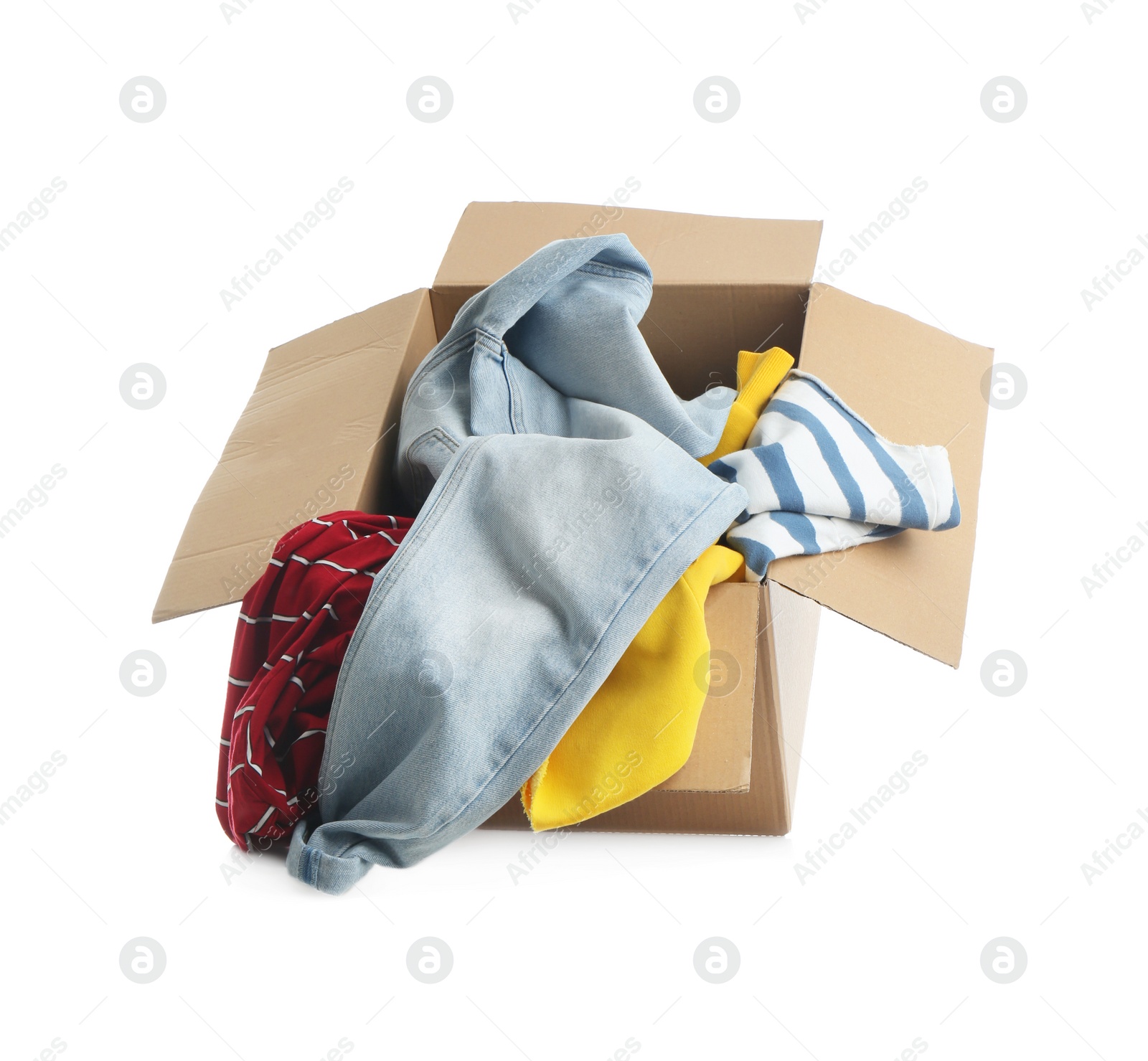 Photo of Cardboard box with clothes isolated on white