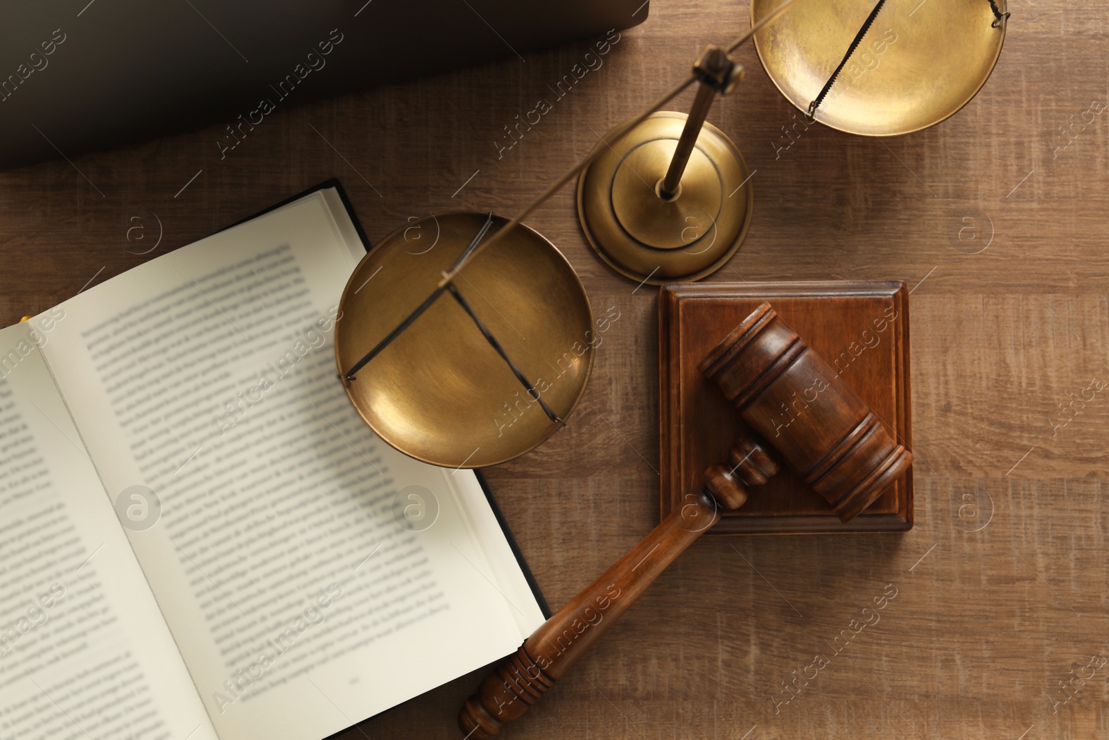 Photo of Law concept. Gavel, book and scales of justice on wooden table, flat lay