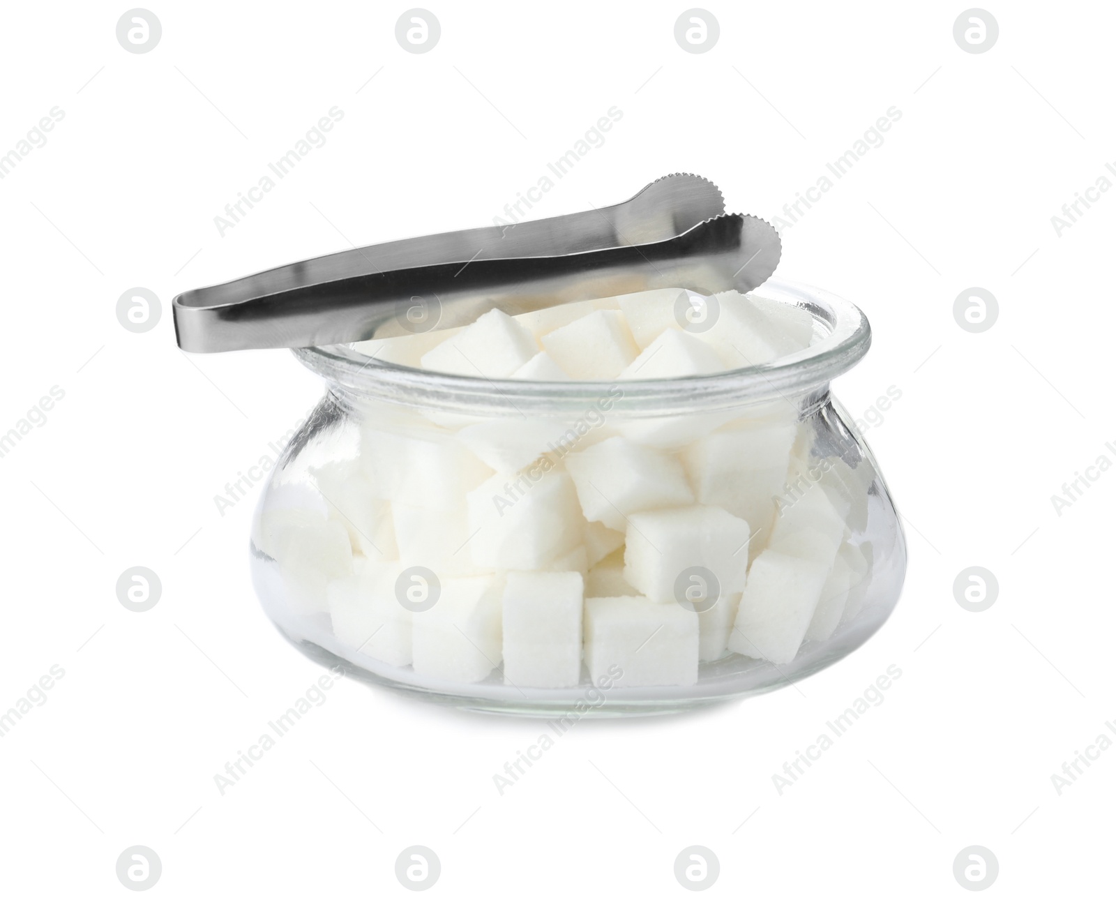 Photo of Glass bowl with sugar cubes and tongs isolated on white