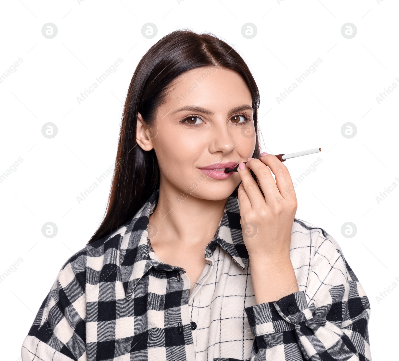 Photo of Woman using cigarette holder for smoking isolated on white