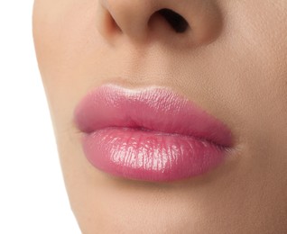 Image of Woman with beautiful perfect lips after permanent makeup procedure on white background, closeup