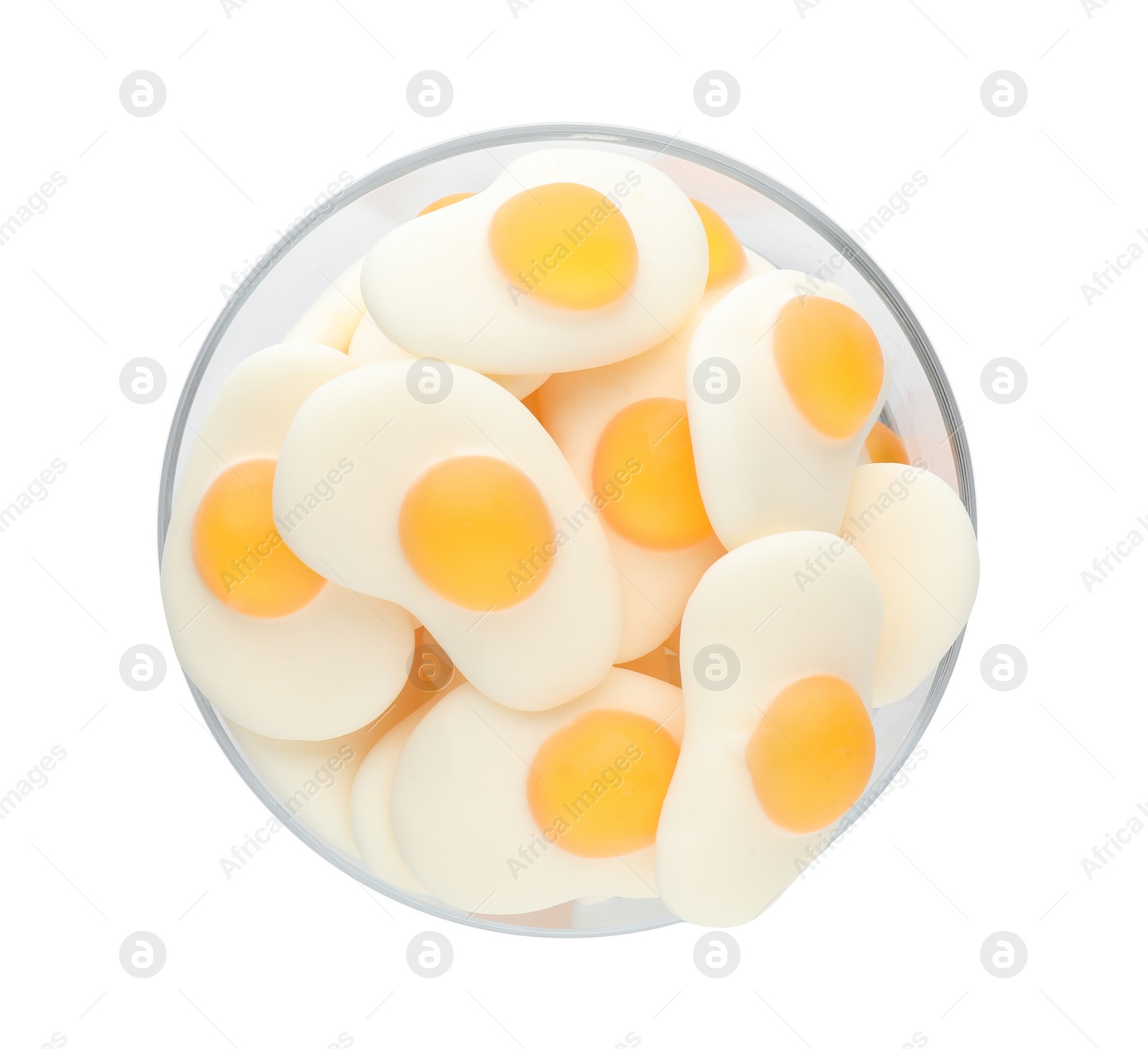 Photo of Bowl with tasty jelly candies in shape of egg on white background, top view