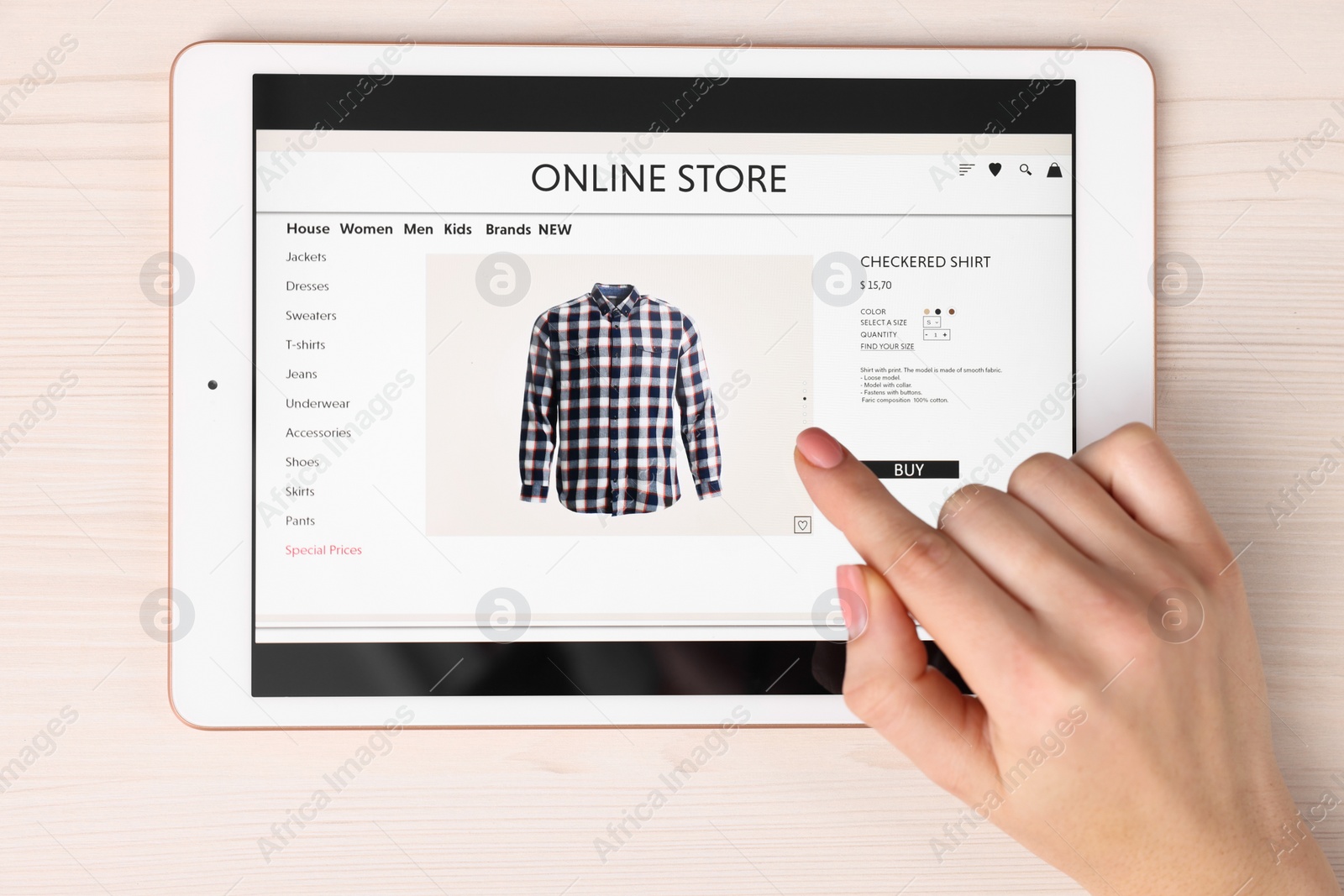 Photo of Woman with tablet shopping online at white wooden table, top view