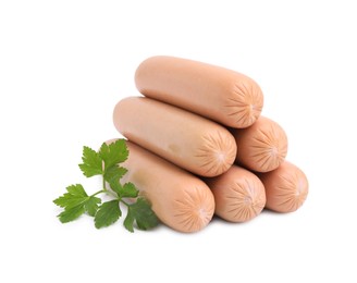 Many delicious boiled sausages and parsley on white background