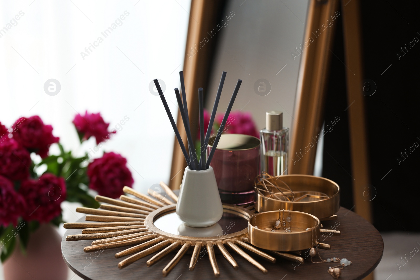 Photo of Composition with stylish accessories and interior elements on table indoors