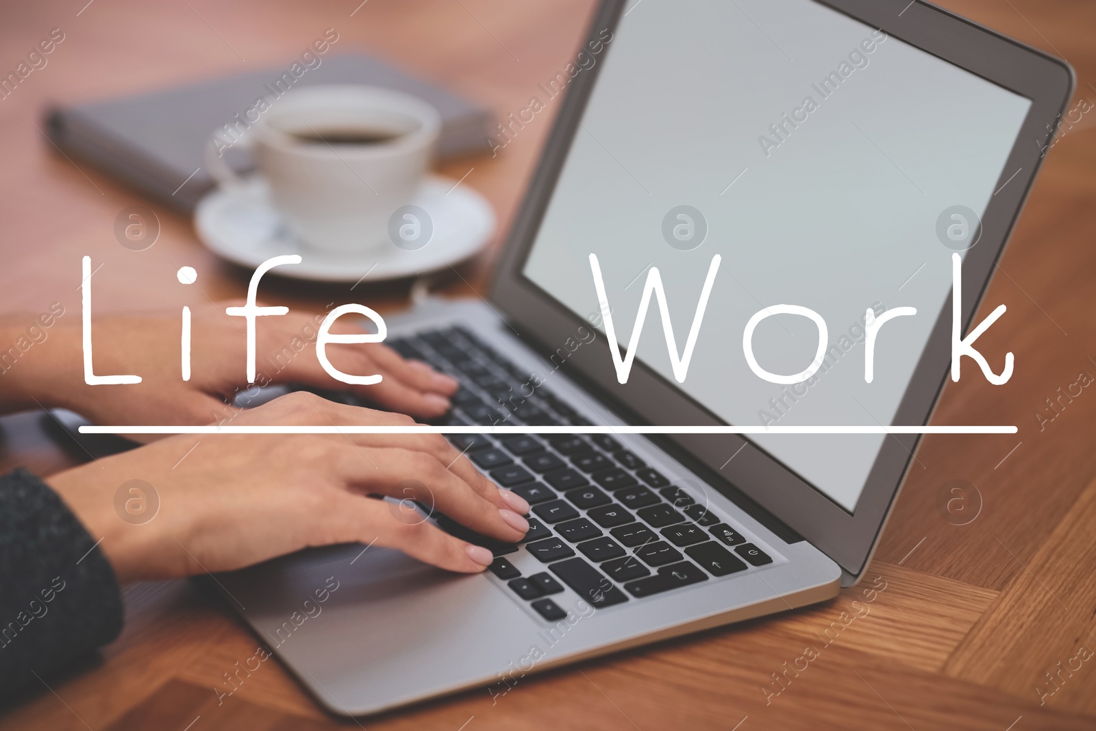 Image of Woman with modern laptop at wooden table, closeup. Concept of balance between work and life
