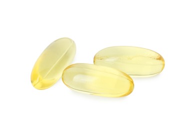 Photo of Vitamin capsules isolated on white. Health supplement