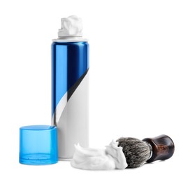 Bottle with shaving foam and brush on white background