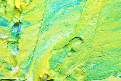 Photo of Bright paint strokes drawn with brush as abstract background