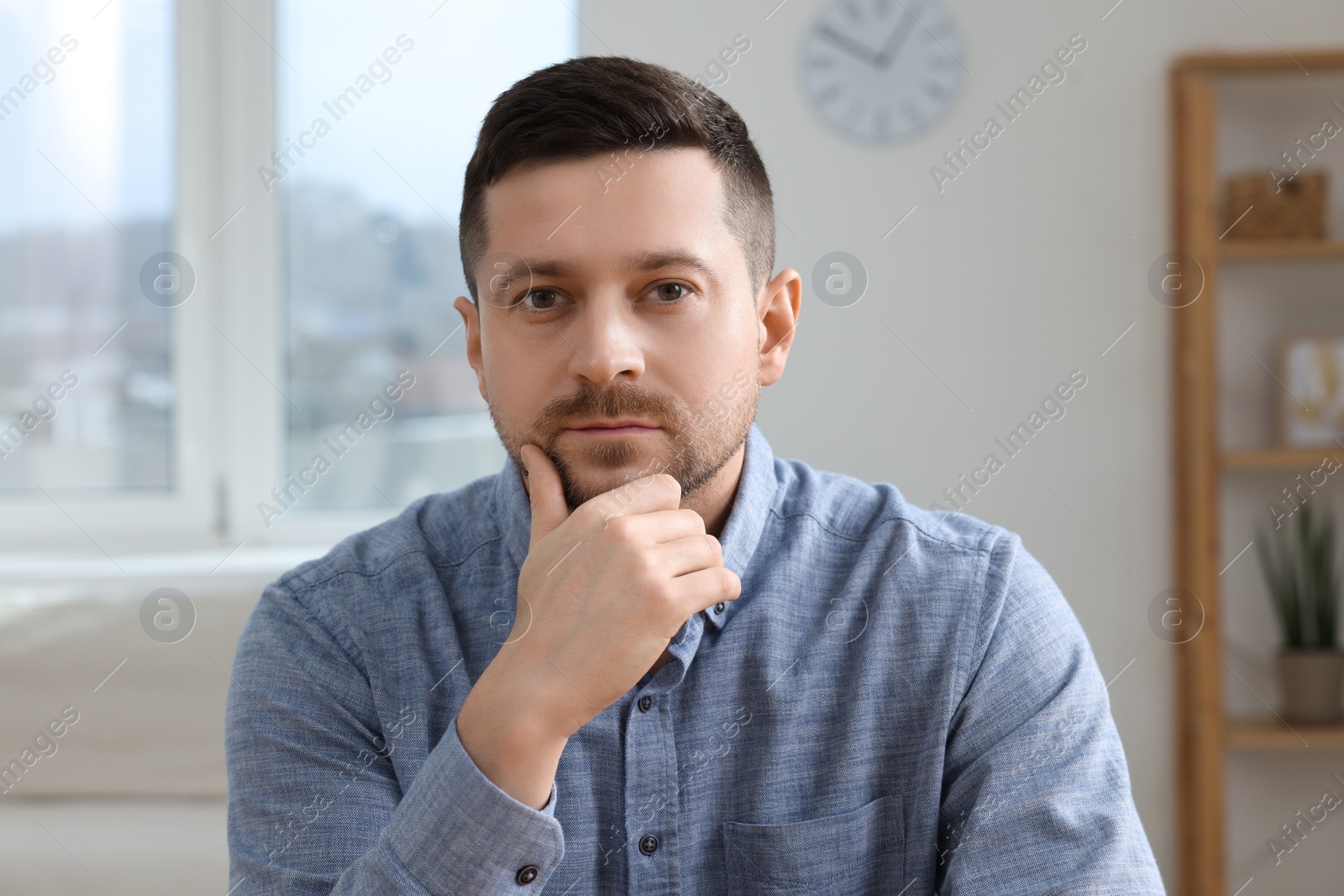 Photo of Man having video call at home, view from web camera