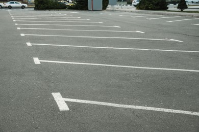 Car parking lots with white marking lines outdoors