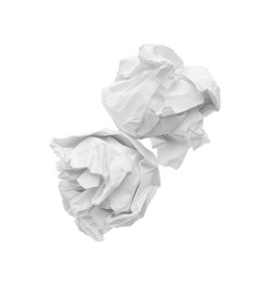 Crumpled sheets of paper on white background, top view