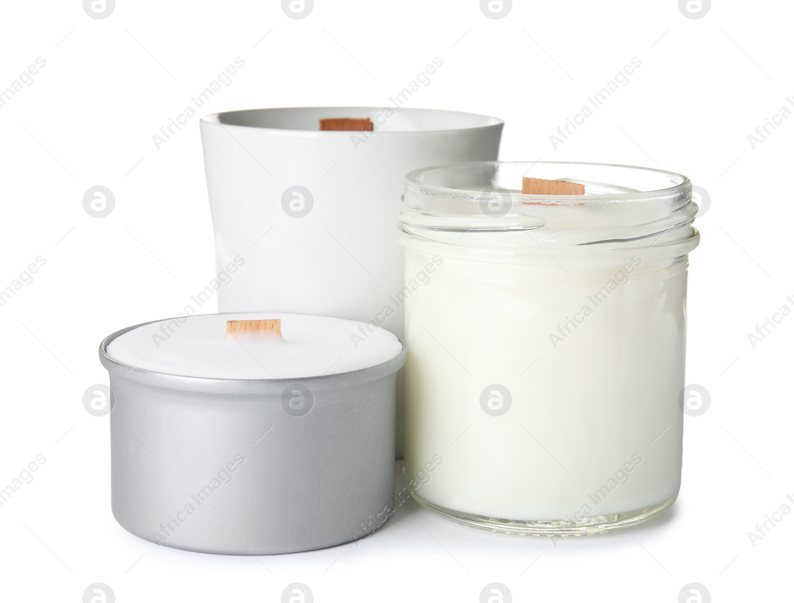 Photo of Beautiful candles with wooden wicks on white background