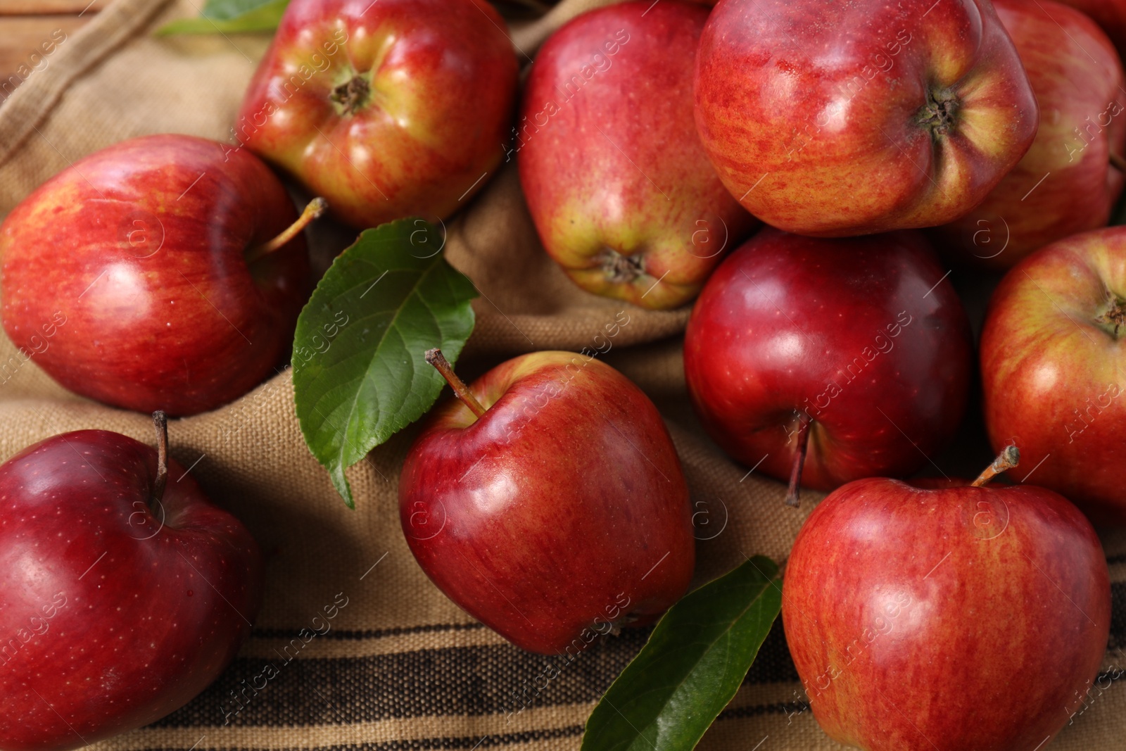 Photo of Fresh ripe red apples on table, closeup