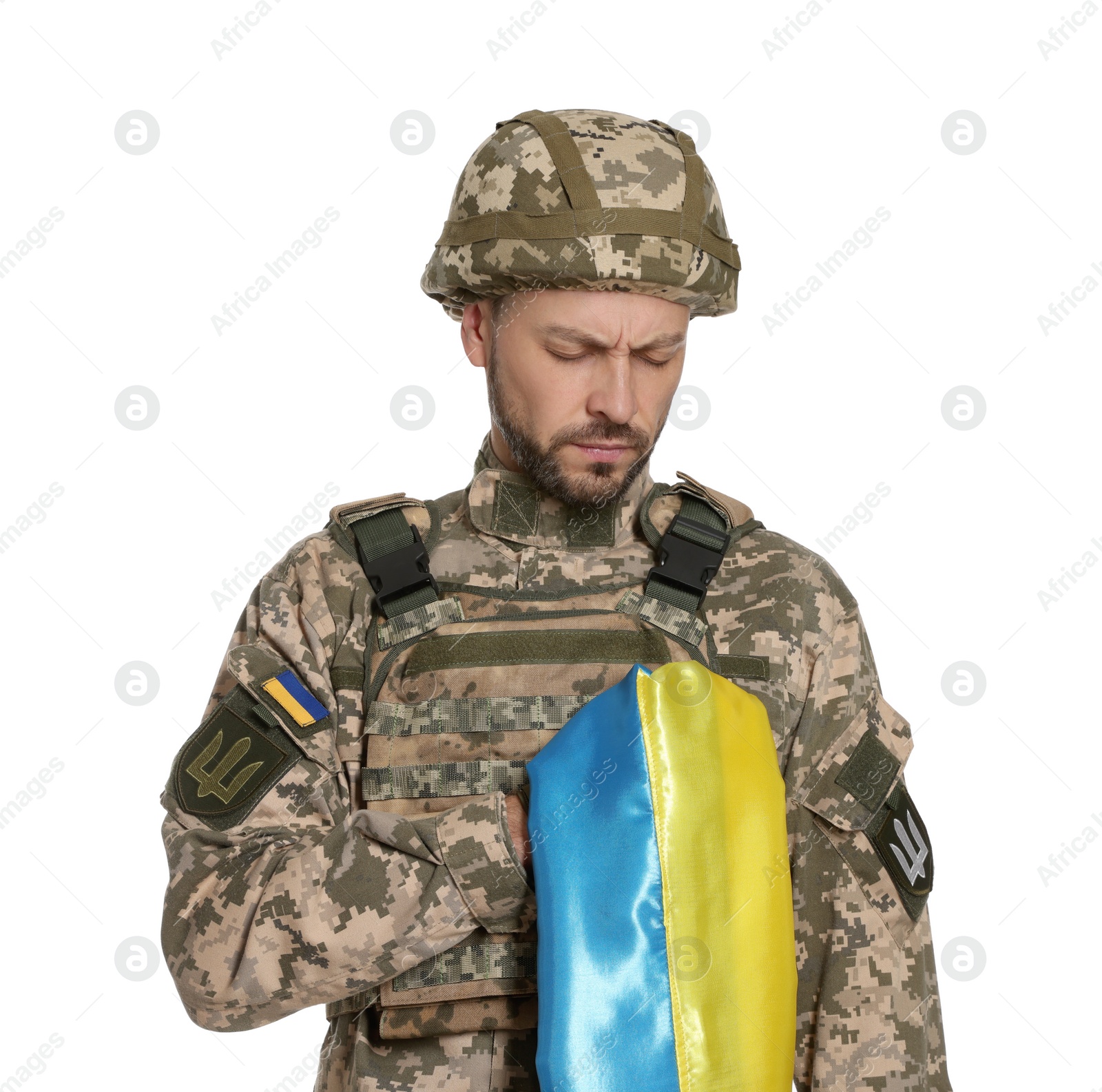 Photo of Soldier in military uniform with Ukrainian flag on white background