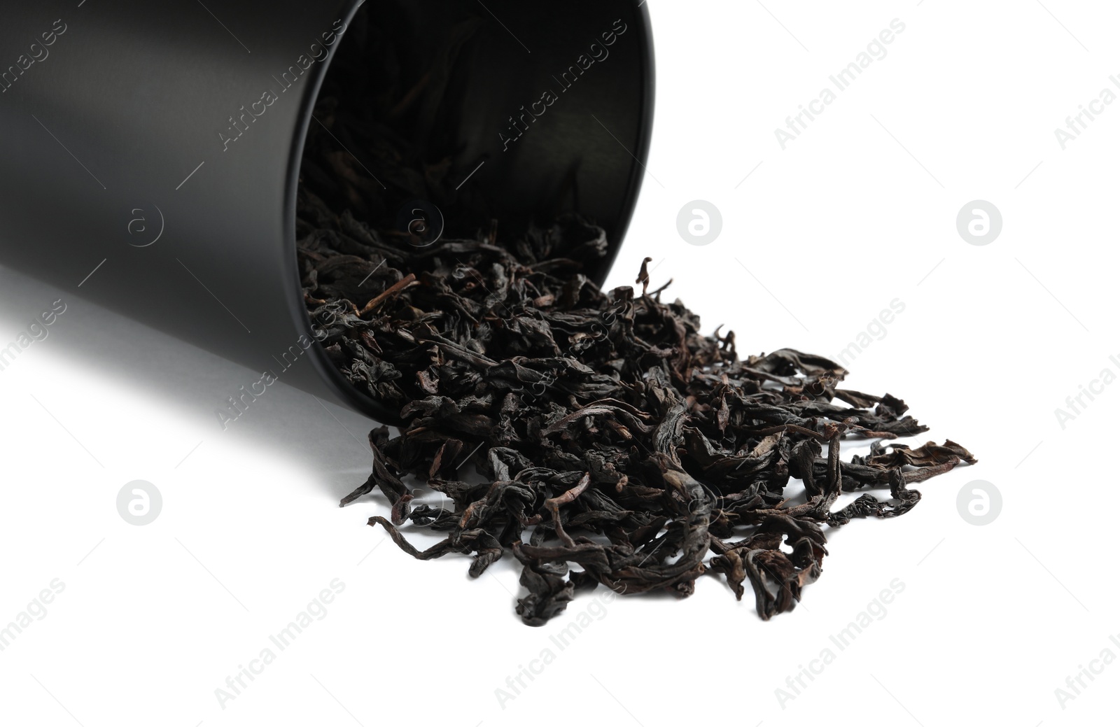 Photo of Da Hong Pao Oolong tea scattered from box on white background