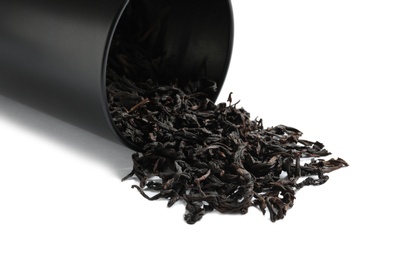 Da Hong Pao Oolong tea scattered from box on white background