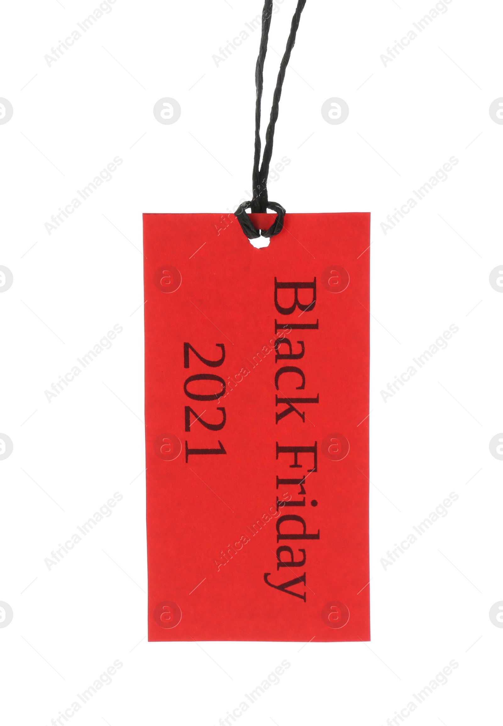 Photo of Red tag with words BLACK FRIDAY 2021 hanging on white background