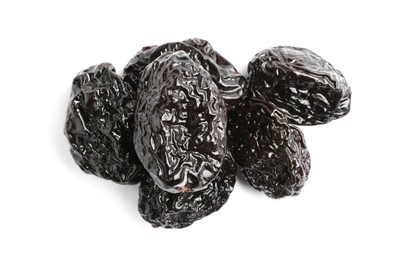 Photo of Heap of sweet dried prunes on white background