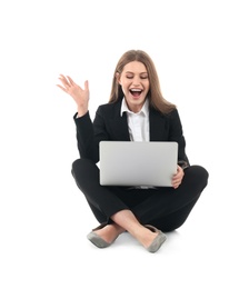 Emotional businesswoman in office wear with laptop celebrating victory on white background