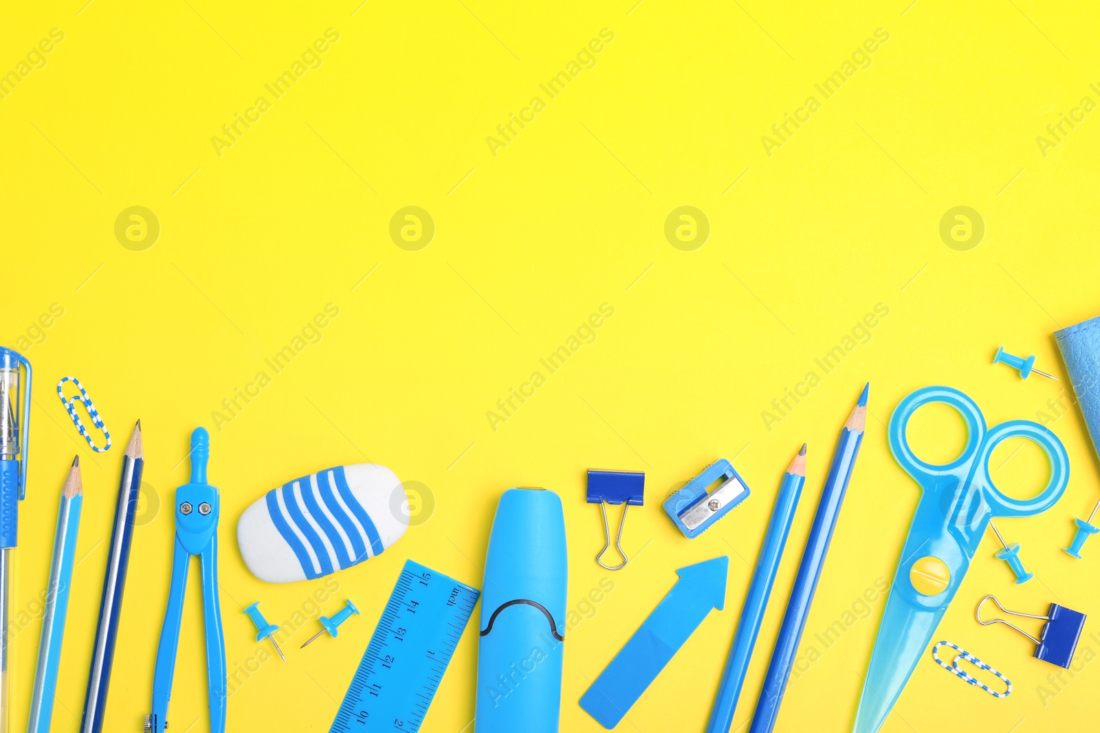 Photo of Flat lay composition with different school stationery on color background