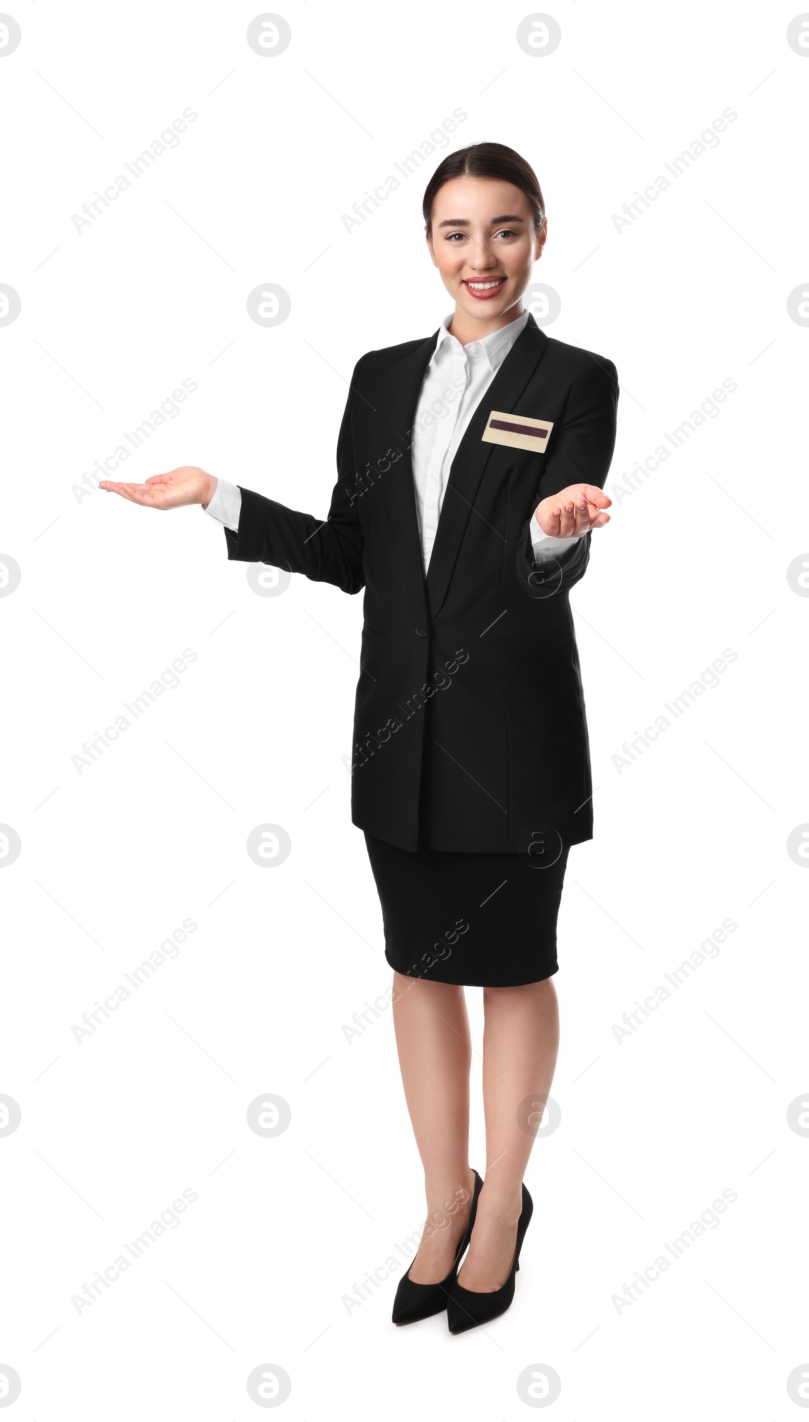 Photo of Full length portrait of happy young receptionist in uniform on white background