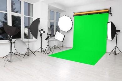 Image of Chroma key compositing. Green backdrop and equipment in studio