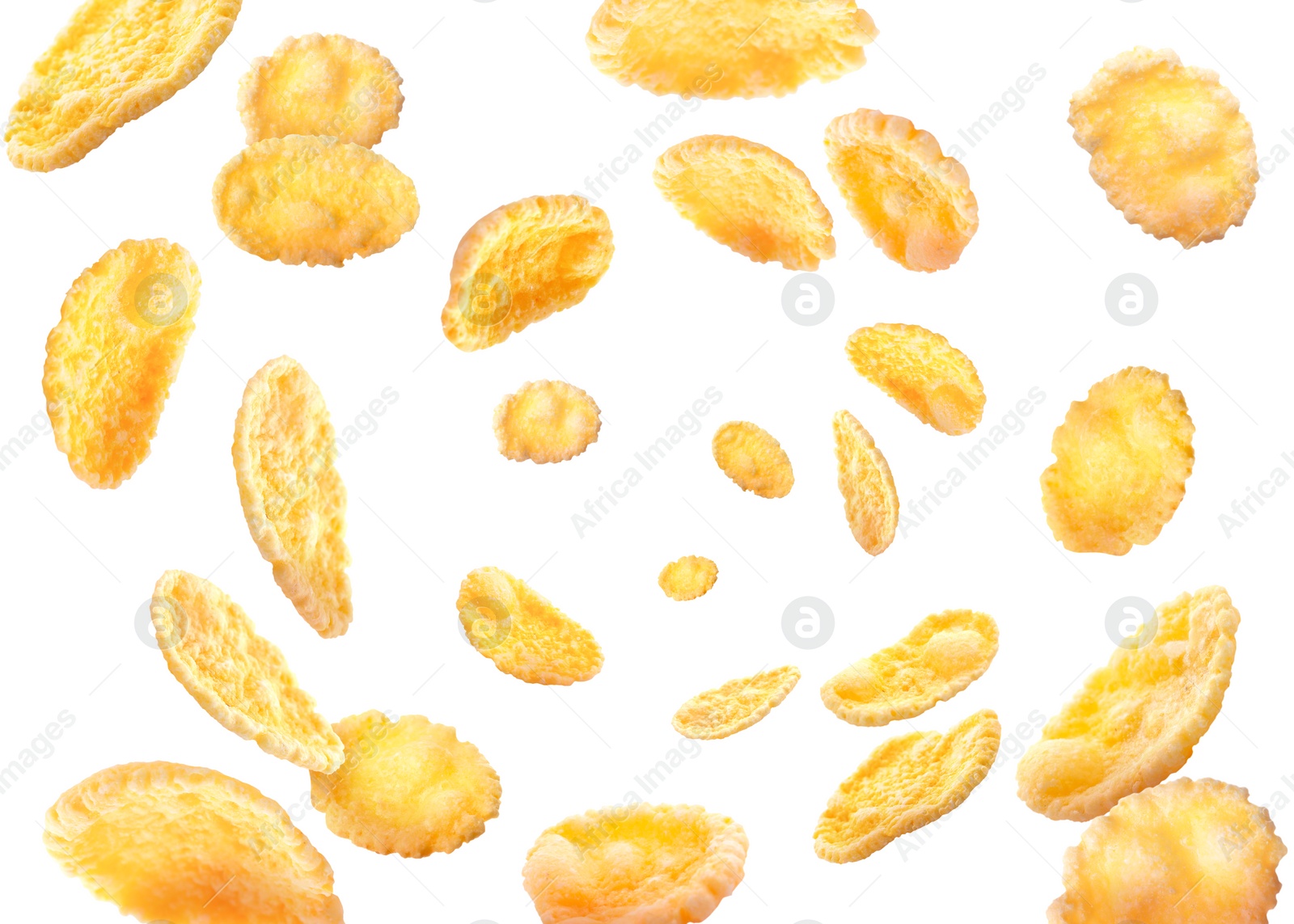 Image of Golden corn flakes whirling on white background