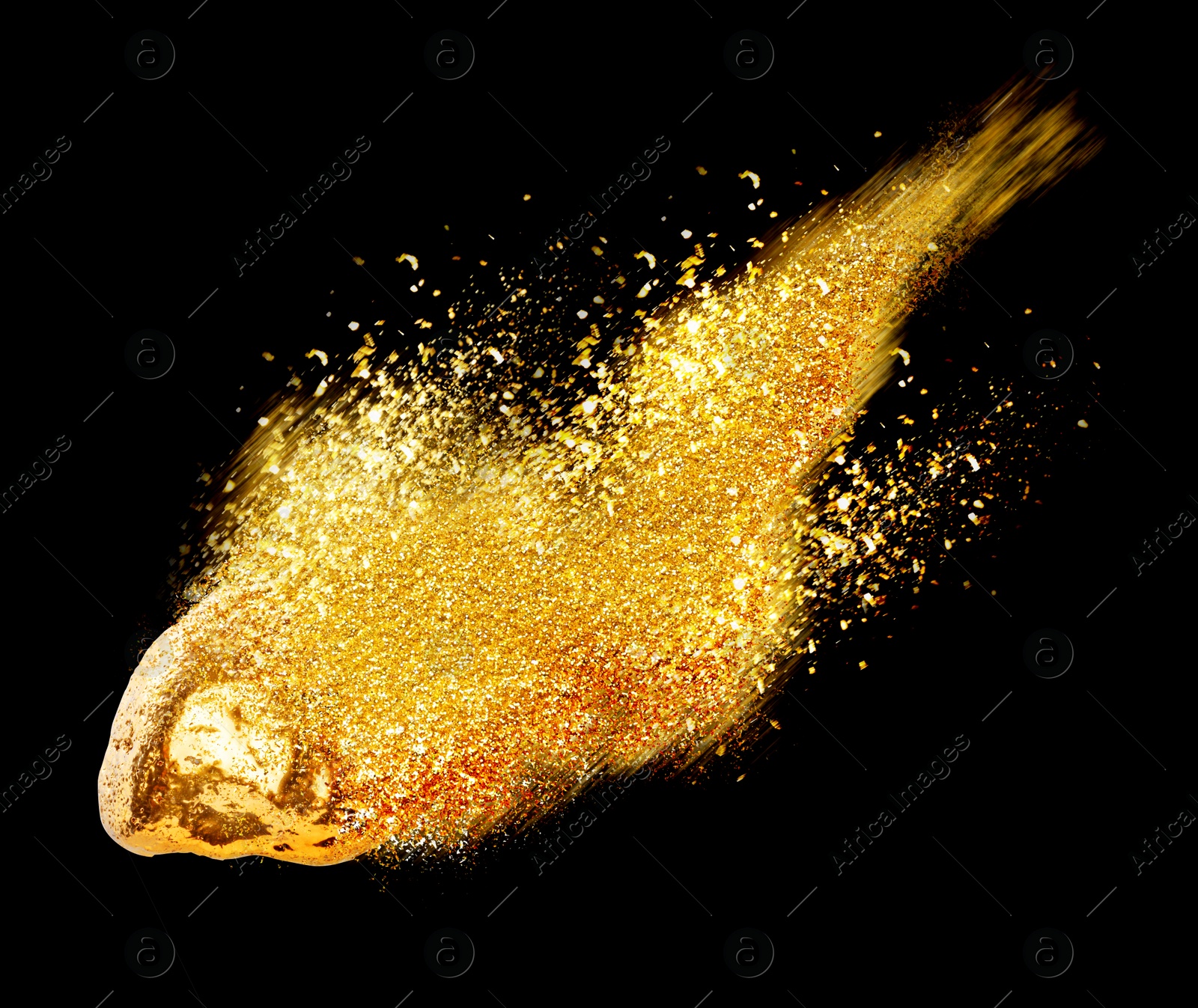 Image of Gold nugget and shiny glitter as comet on black background