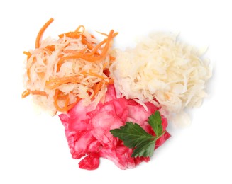 Photo of Delicious sauerkraut prepared according to different recipes with parsley on white background, top view