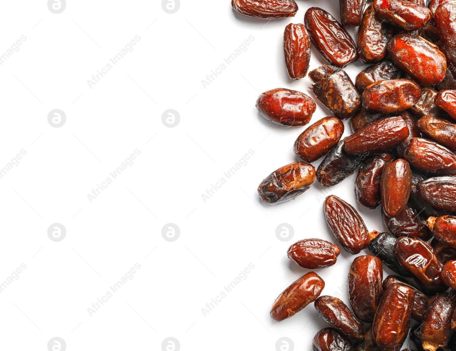 Photo of Sweet dried date fruits on white background, top view