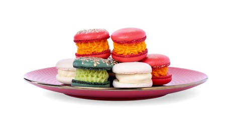 Photo of Beautifully decorated Christmas macarons in plate isolated on white