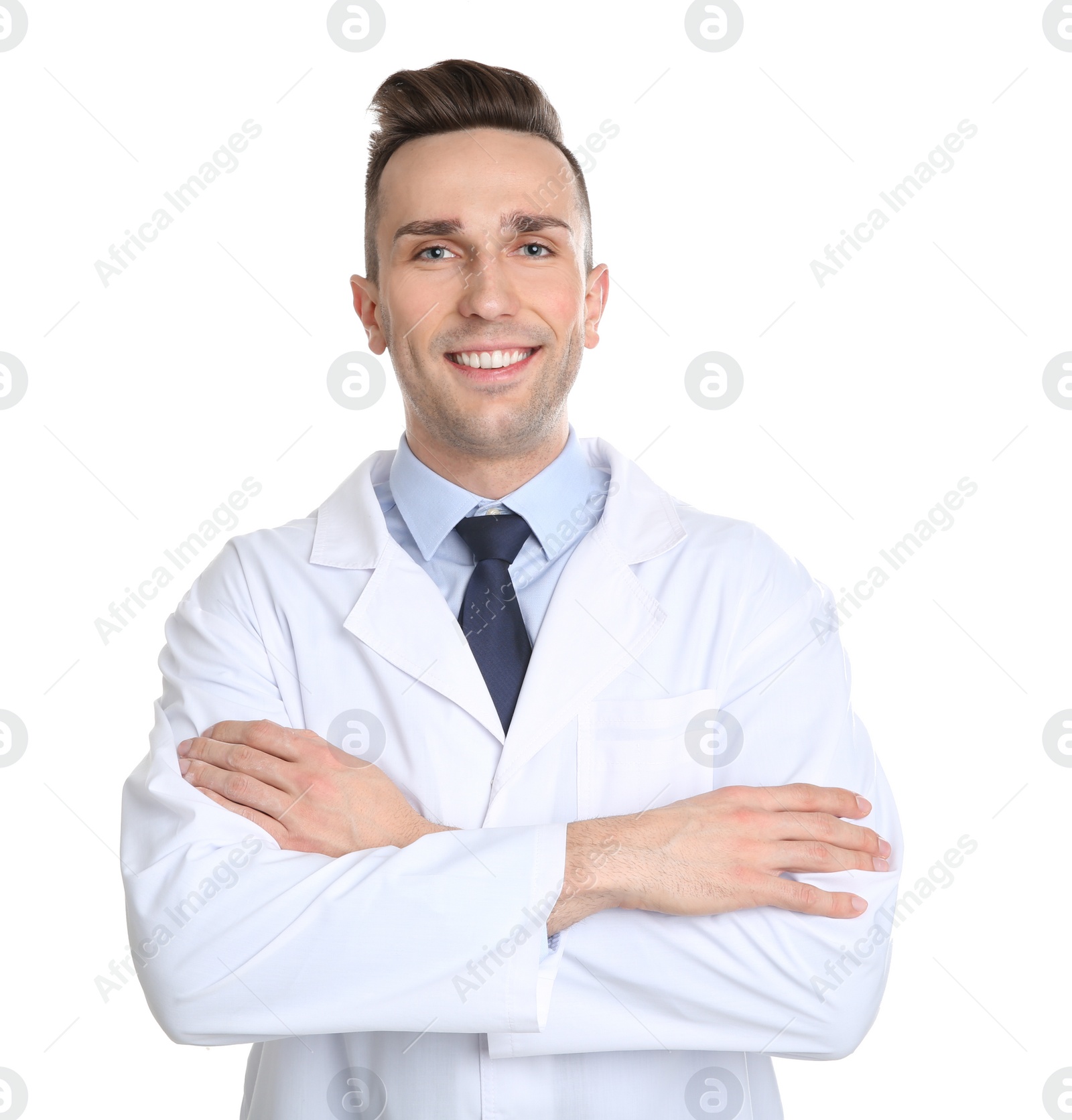Photo of Portrait of male dentist on white background